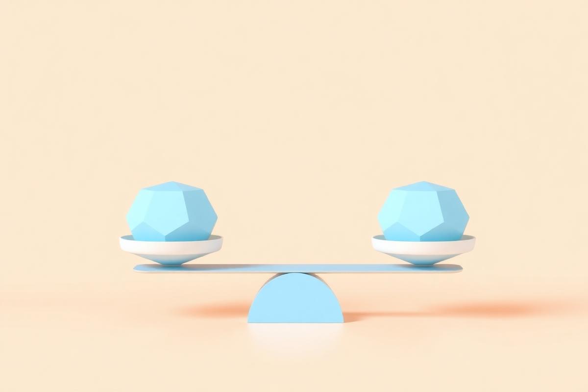 Balanced scale holding two pale blue geometric shapes